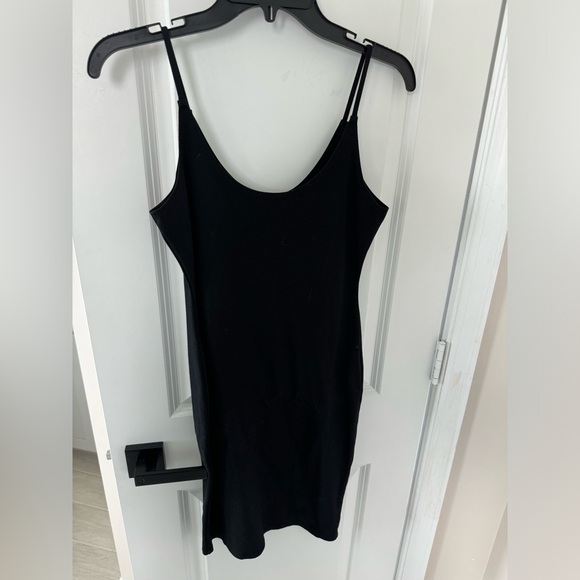 Basic black tank dress. Worn only once. Size medium - Picture 2 of 3